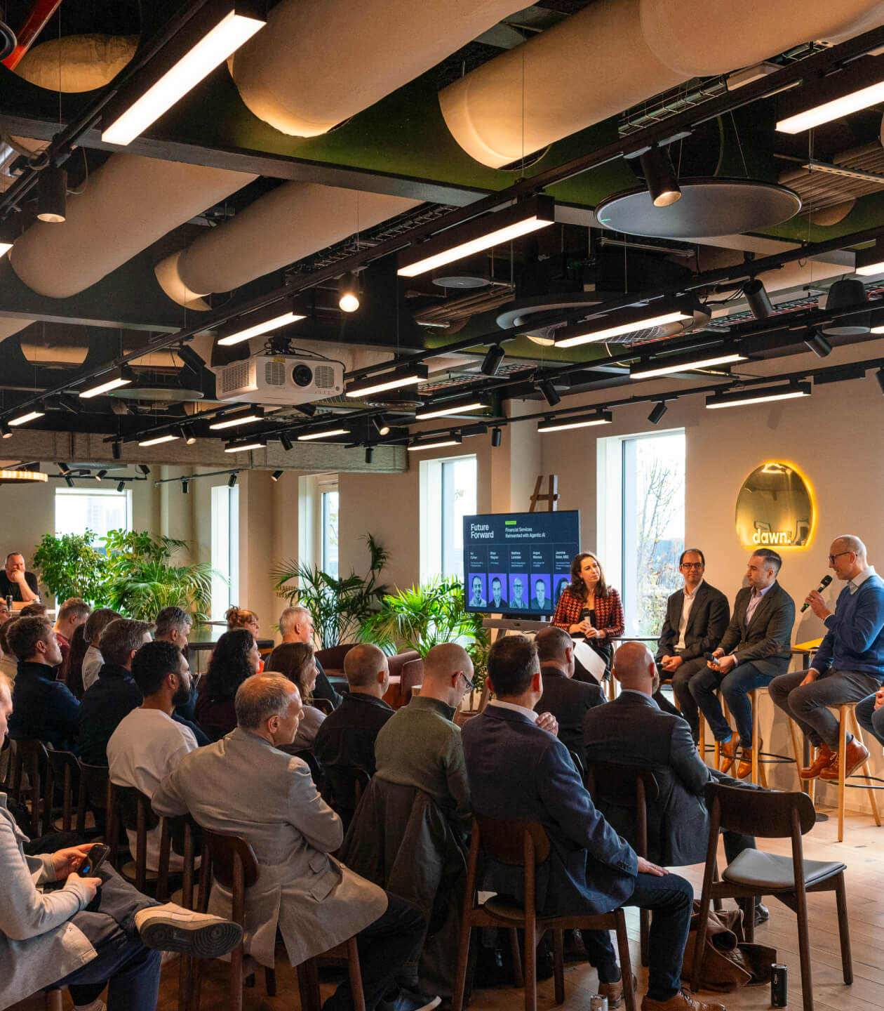 A panel discussion on stage at Dawn Capital, London.